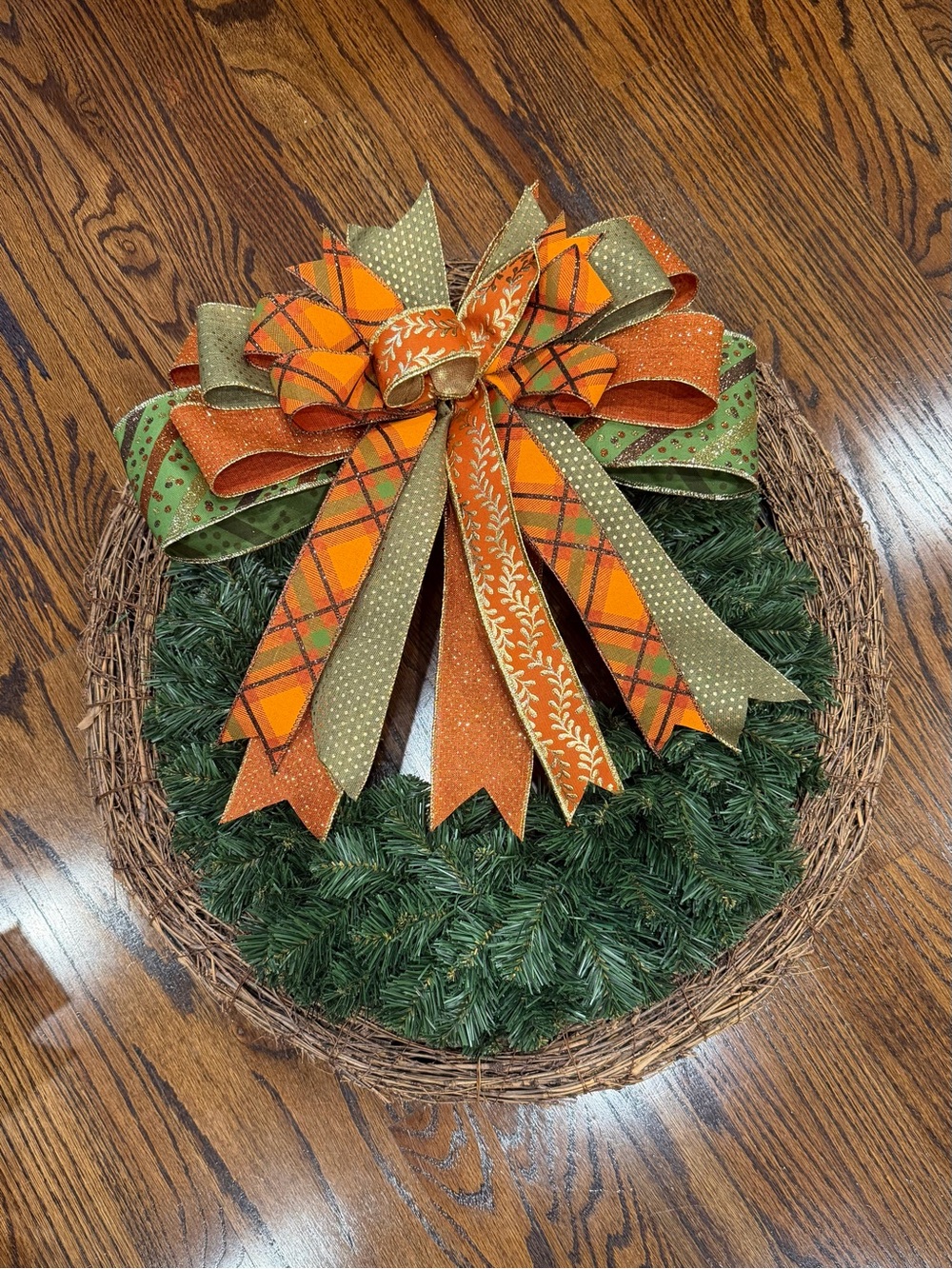 Festive Green Pine Wreath with Orange & Olive Ribbon Bow